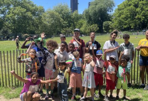 Photo of young people in Fort Greene Park on day of 2022 Walk-a-Thon.