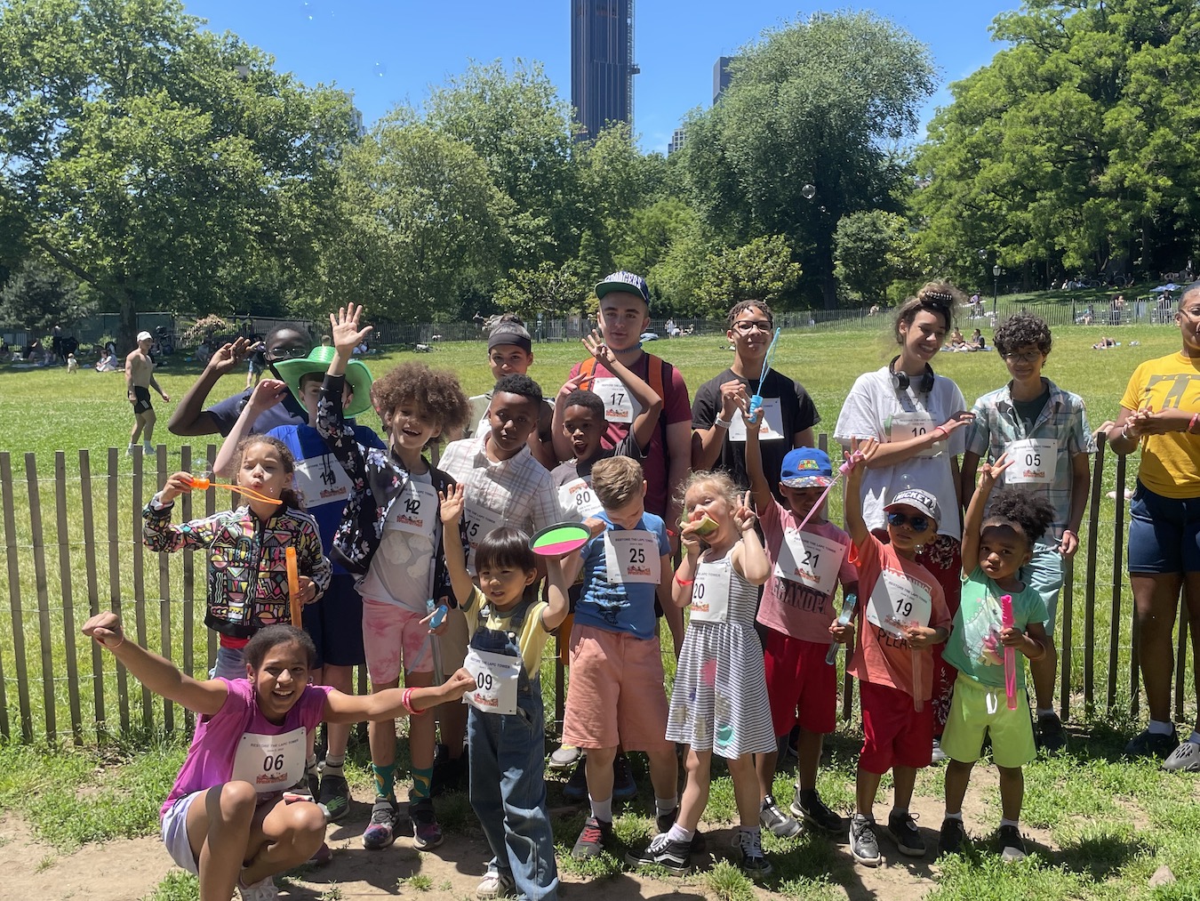 Photo of young people in Fort Greene Park on day of 2022 Walk-a-Thon.