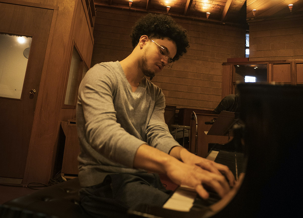 Tyler Bullock ll playing the piano