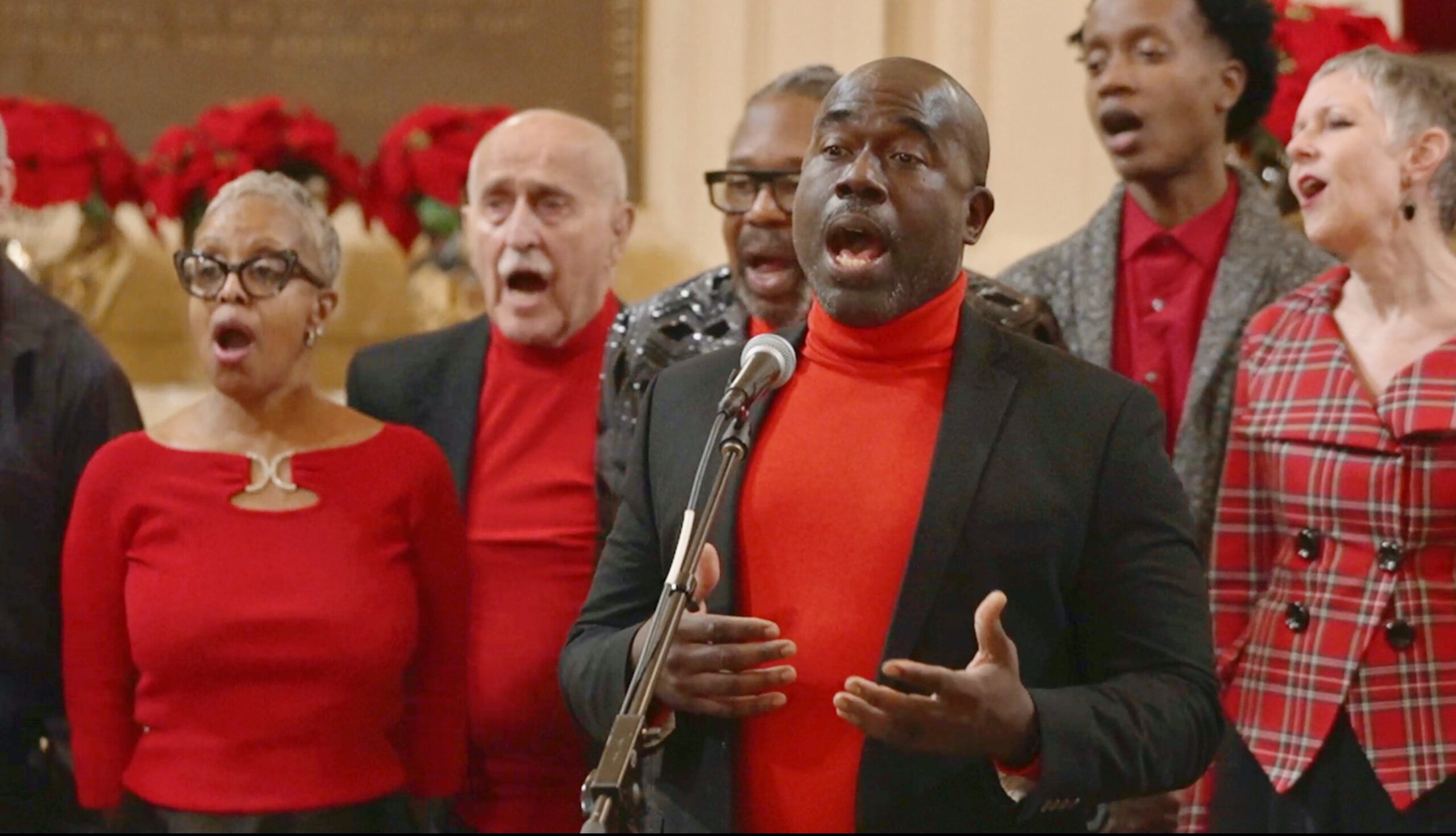 Members of the choir singing Christmas music